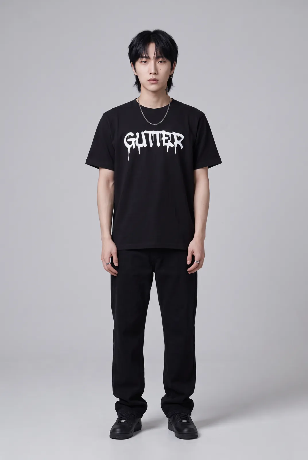 Jae Park wearing the GUTTER Tee in Black, front hero