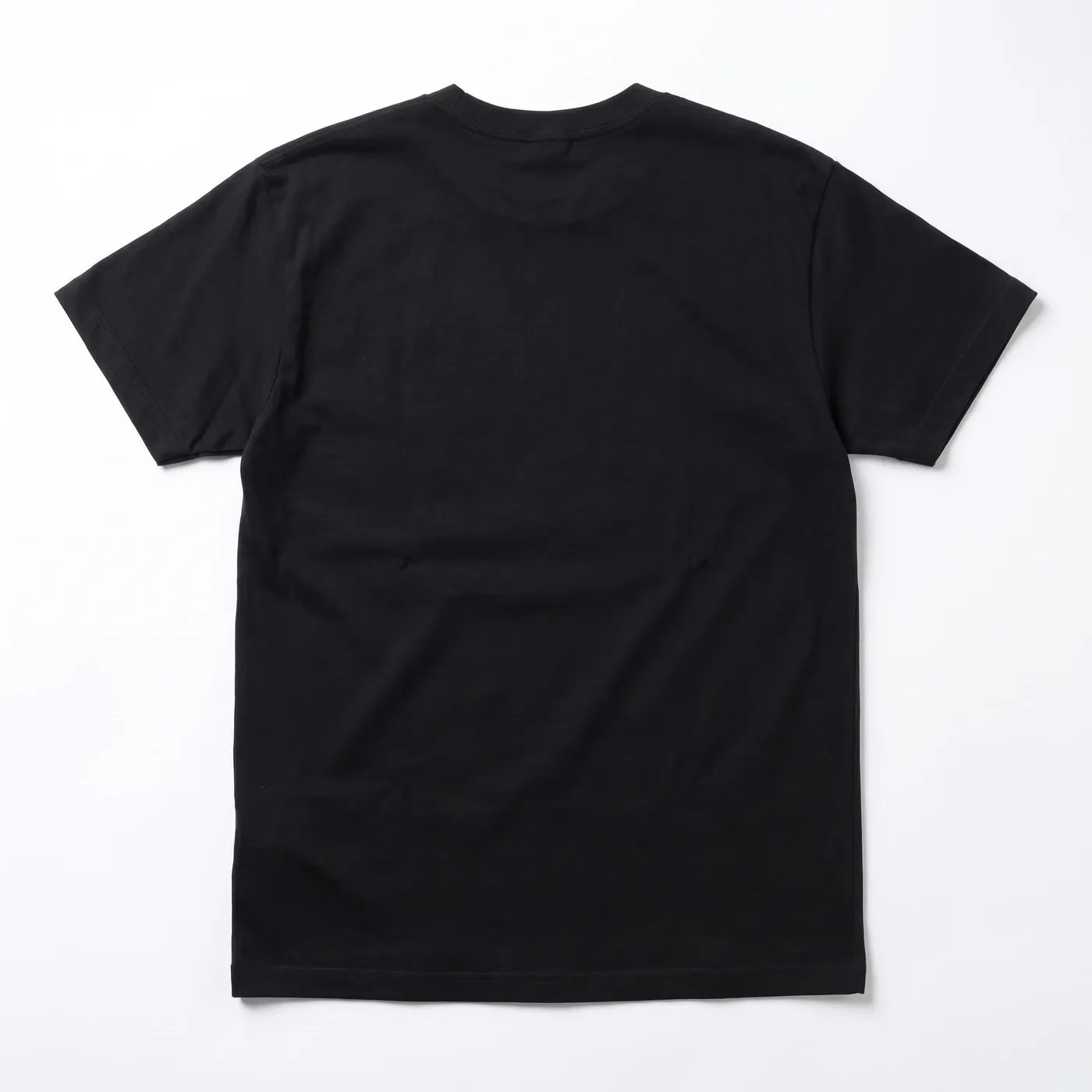 HEAVY ROTATION Tee in Black, laid flat, back