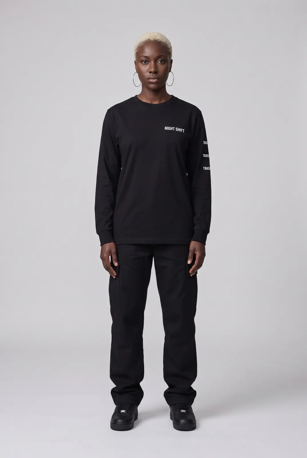Imani Okafor wearing the NIGHT SHIFT Longsleeve in Black, front hero