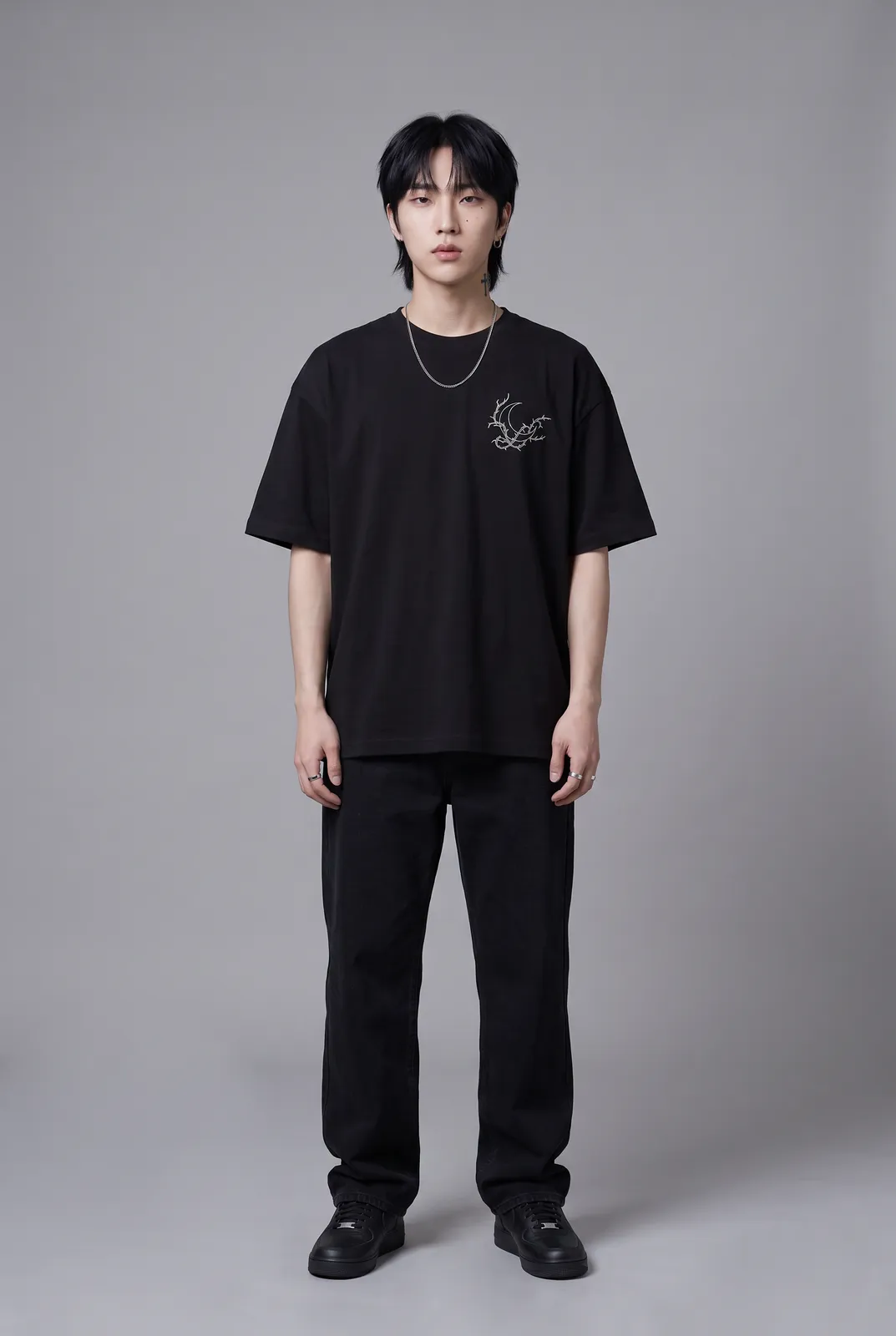 Jae Park wearing the NOCTURNE Oversized in Black, front hero