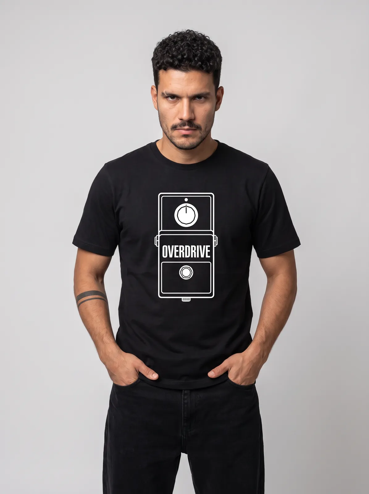 Diego Alvarez wearing the OVERDRIVE Tee in Black, waist up crop