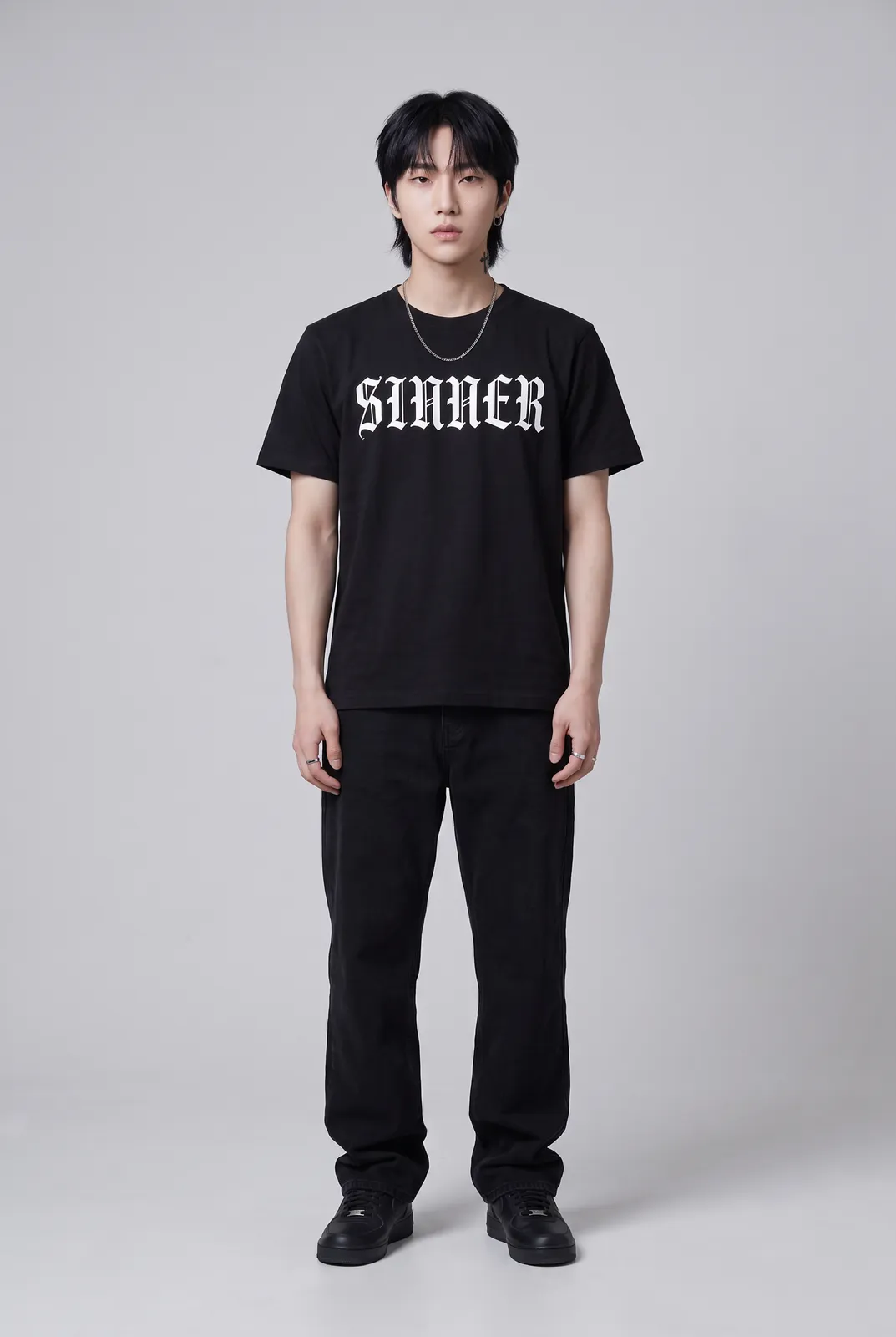 Jae Park wearing the SINNER Tee in Black, front hero